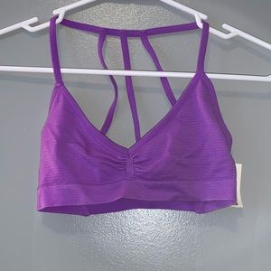 White and purple workout sports bra